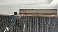 Servis pintu harmonika Rolling Door